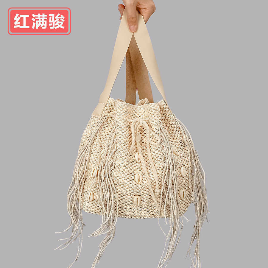 Summer Handwoven Shell Tassel Grass Woven Bag Women's Vine Woven Beach Handbag Large Capacity One Shoulder Oblique Straddle Bag 230527, Beige8
Summer Handwoven Shell Tassel Grass Woven Bag Women's Vine Woven Beach Handbag Large Capacity One Shoulder Oblique Straddle Bag 230527, Beige8