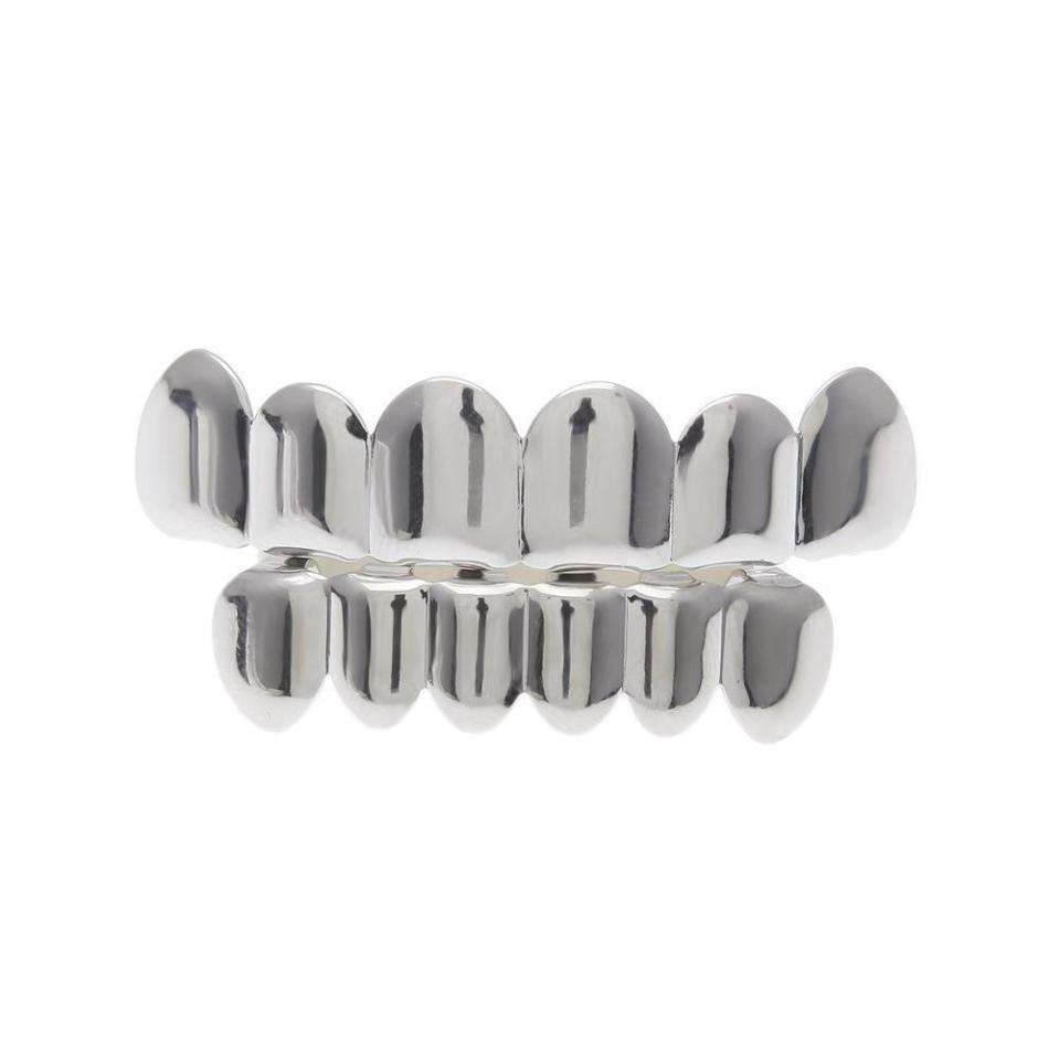 New Custom Fit Gold Plated Hip Hop Rock Teeth Grillz Caps Top Bottom Grill Set For Christmas Party Vampire Teeth3869681
New Custom Fit Gold Plated Hip Hop Rock Teeth Grillz Caps Top Bottom Grill Set For Christmas Party Vampire Teeth3869681