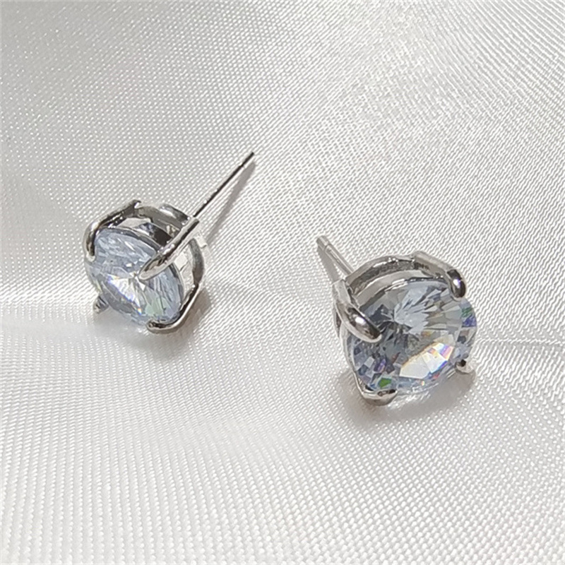 Unisex Diamond-Like Crystal Stud Earrings in 18K Gold Perfect Accessory