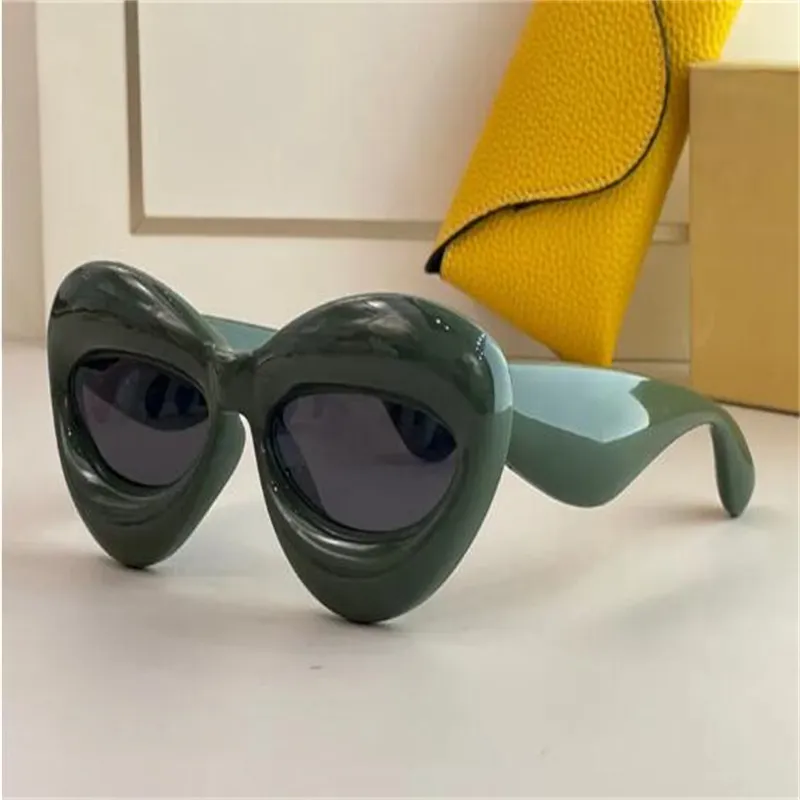 Fashion trendy designer 40097 sunglasses for women vibrant colors acetate Inflatable cat-eye glasses summer wacky hip-hop style Anti-Ultraviolet come with case
Fashion trendy designer 40097 sunglasses for women vibrant colors acetate Inflatable cat-eye glasses summer wacky hip-hop style Anti-Ultraviolet come with case