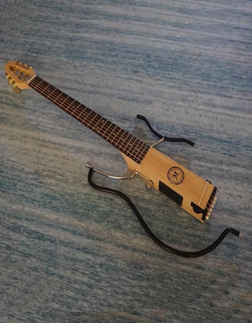 In Stock mini travel electric guitar portable mute folk guitar high comfort guitar patent products genuine whole2648061
In Stock mini travel electric guitar portable mute folk guitar high comfort guitar patent products genuine whole2648061