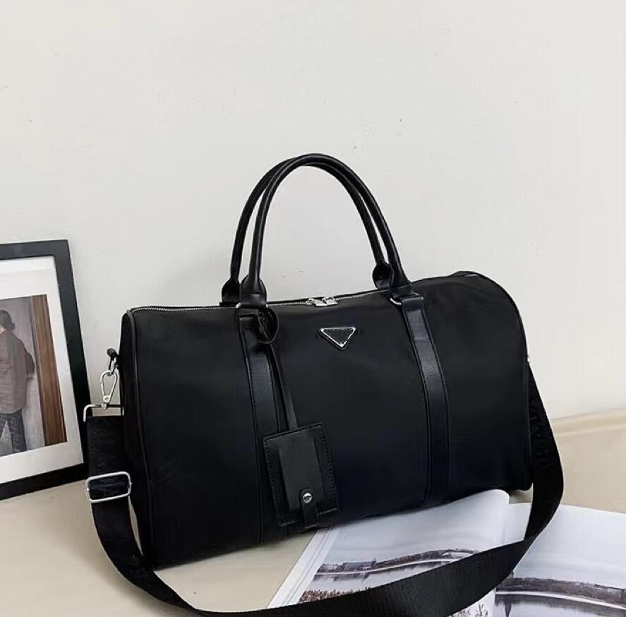 New Fashion High quality Travel Bags Nylon Handbags Large Capacity Holdall Carry On Luggages Duffel Bags Luxury Men Luggage Gentleman Commerce, Travelling bag
New Fashion High quality Travel Bags Nylon Handbags Large Capacity Holdall Carry On Luggages Duffel Bags Luxury Men Luggage Gentleman Commerce, Travelling bag