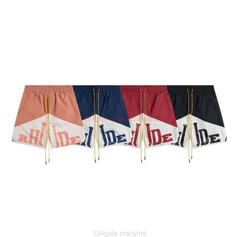 Designer Short Fashion Casual Clothing Beach shorts Rhude Patchwork Color Contrast Letter Printed Capris Straight Rope High Street Casual Summer Loose Straight Tu, Black 1
Designer Short Fashion Casual Clothing Beach shorts Rhude Patchwork Color Contrast Letter Printed Capris Straight Rope High Street Casual Summer Loose Straight Tu, Black 1