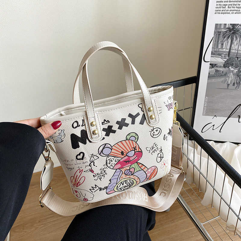 Handbag Large Capacity Women s 2023 New Korean Fashion Versatile Personalized Graffiti Shoulder Bag Fashion Cartoon Bucket 230529