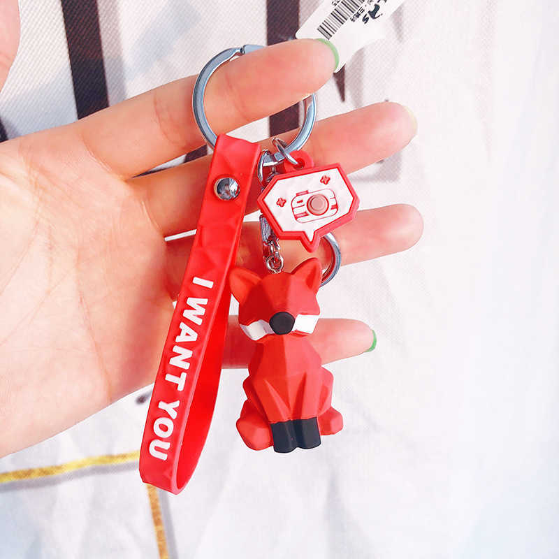 Key Rings Fashionable and cute dinosaur car keyring cartoon female PVC animal keychain hanging rope handbag accessory Trinket G230526