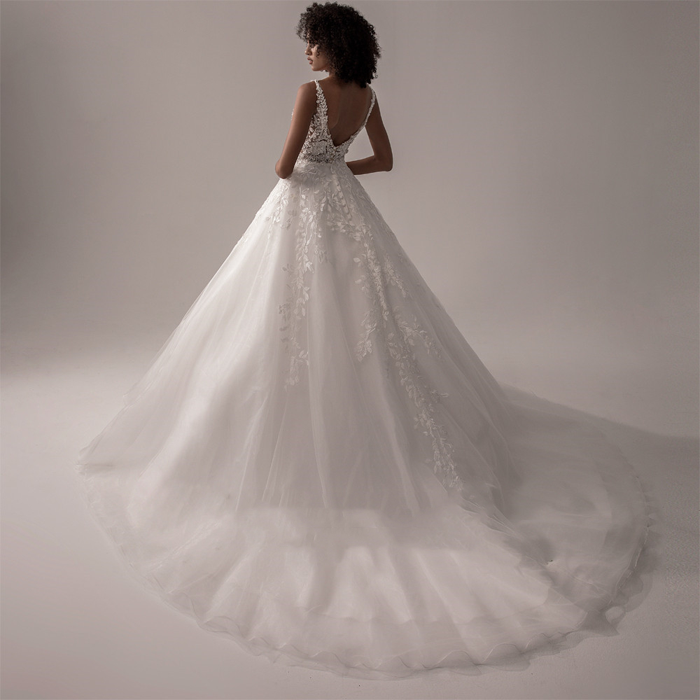 Romantic Ivory A Line Wedding Dresses Sleeveless V-Neck Backless Sexy Long Tulle Bridal Gowns Lace Appliqued Beaded Summer Boho Bride Dress 2024