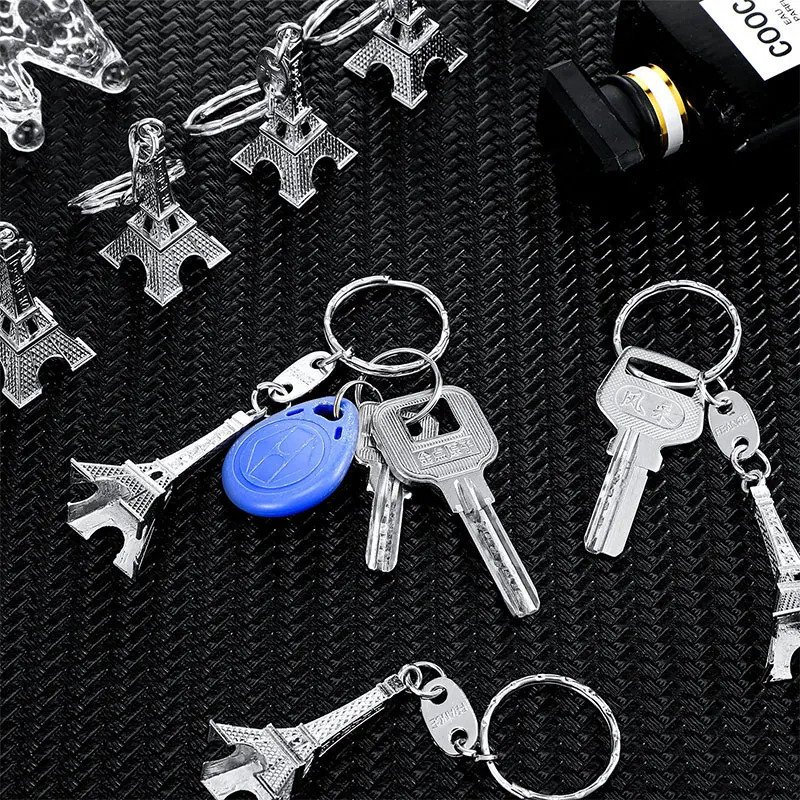 Keychains Lanyards 50Pcs Paris Eiffel Tower Shape Keychain Novelty Gadget Trinket Souvenir Christmas Gift Keychain Alloy 231205