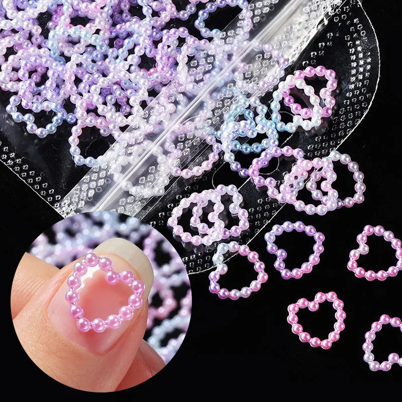 Nail Art Decorations 100PcsBag Hollow Heart Pearl Nail Art Charms White Pink Purple Pearl Round Flatback 3D Nail Decoration DIY Nail Accessories 23120