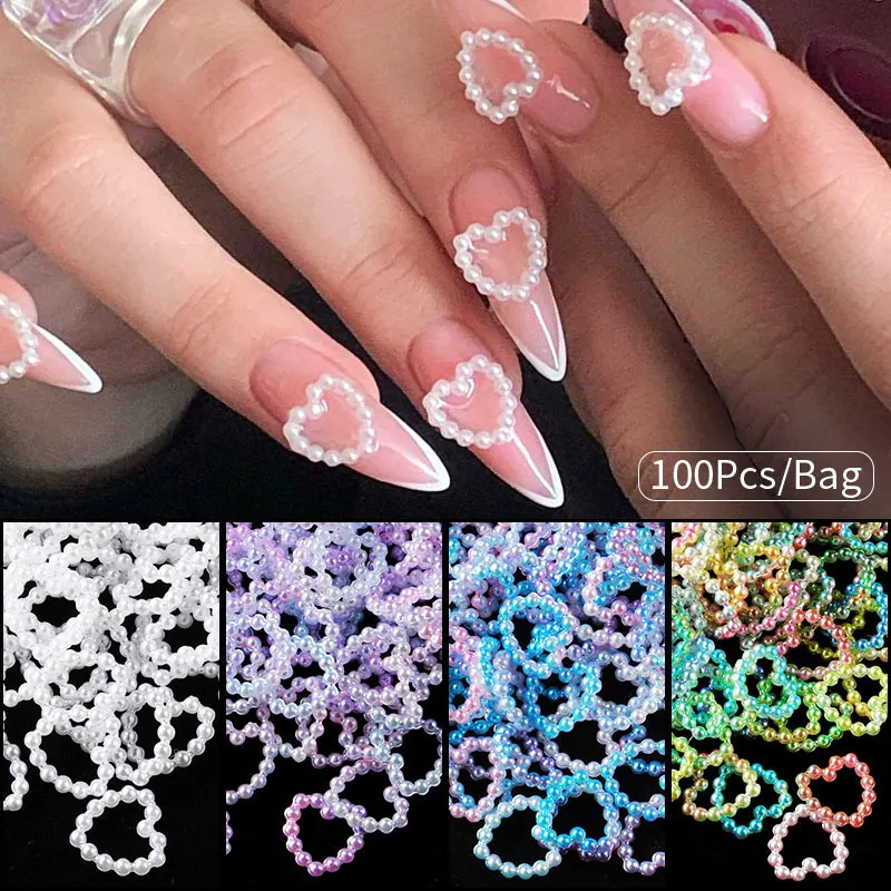 Nail Art Decorations 100PcsBag Hollow Heart Pearl Nail Art Charms White Pink Purple Pearl Round Flatback 3D Nail Decoration DIY Nail Accessories 23120