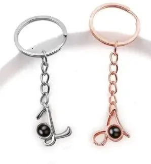 Key Rings AZ Letter Po Keychain Cherished Custom Projection Chain Personalized Picture Ring Colorful Image Memory of love 231206
