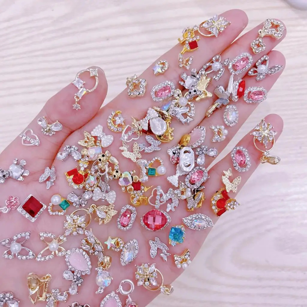 Nail Art Decorations 50Pcs Beautiful Metal GlassResin Nail Art Rhinestones 3D Butterfly PendantCrystal Nail Decoration DIY Spring Manicure Accesso 231