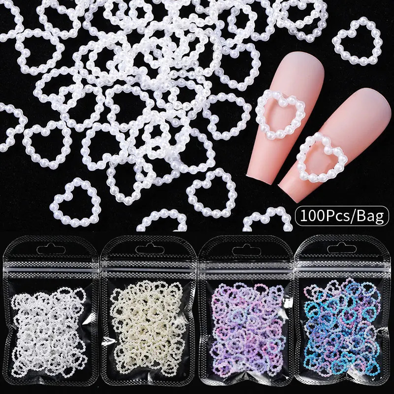 Nail Art Decorations 100PcsBag Hollow Heart Pearl Nail Art Charms White Pink Purple Pearl Round Flatback 3D Nail Decoration DIY Nail Accessories 23120