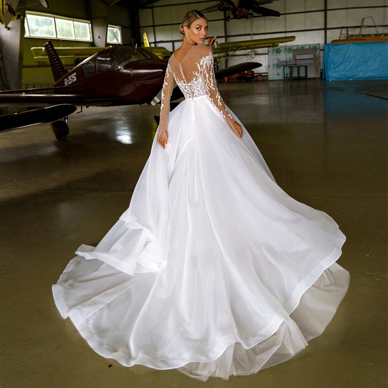 Hollow Jewel Applique Wedding Dresses For Bride Covered Button Attractive Long Sleeve A-Line Mordern Sweep Train
