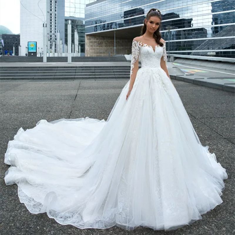 Long Train A Line Beach Wedding Dresses Lace Appliques Ivory Tulle Bridal Gowns Sheer Neck Long Sleeves Luxury Bride Dress 2024 Spring Vestido De Novi