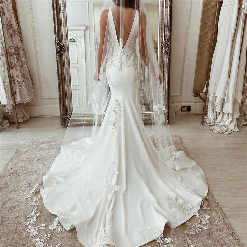 Sexy Backless Mermaid Wedding Dresses Court Train Lace Appliques Deep V-Neck Sleeveless Summer Long Satin Bridal Gowns Lace Appliques Charming Boho Br