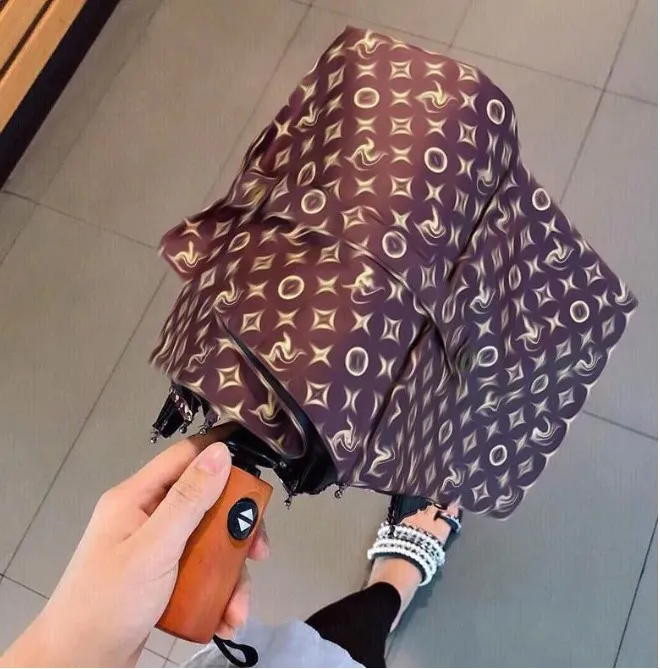 2023 fashion hipster umbrellas automatic folding luxury top quality outdoor travel louis vouitton lv lvt vuittonly designer multifunction sun