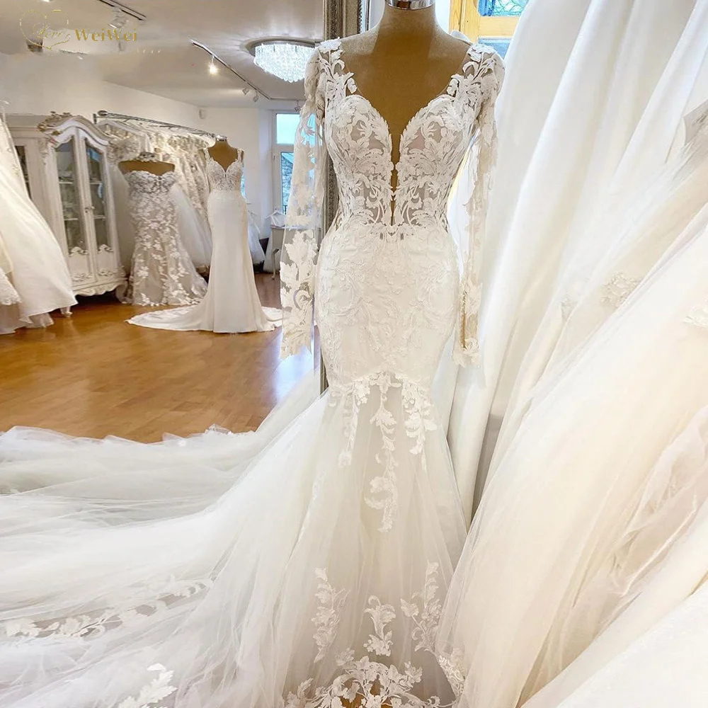 Ivory Wedding Gorgeous Mermaid Dresses Lace Appliques Chapel Train Long Sleeves Beach Bridal Gowns Deep V-neck Backless Sexy Bride Dress 2024 Bohemian