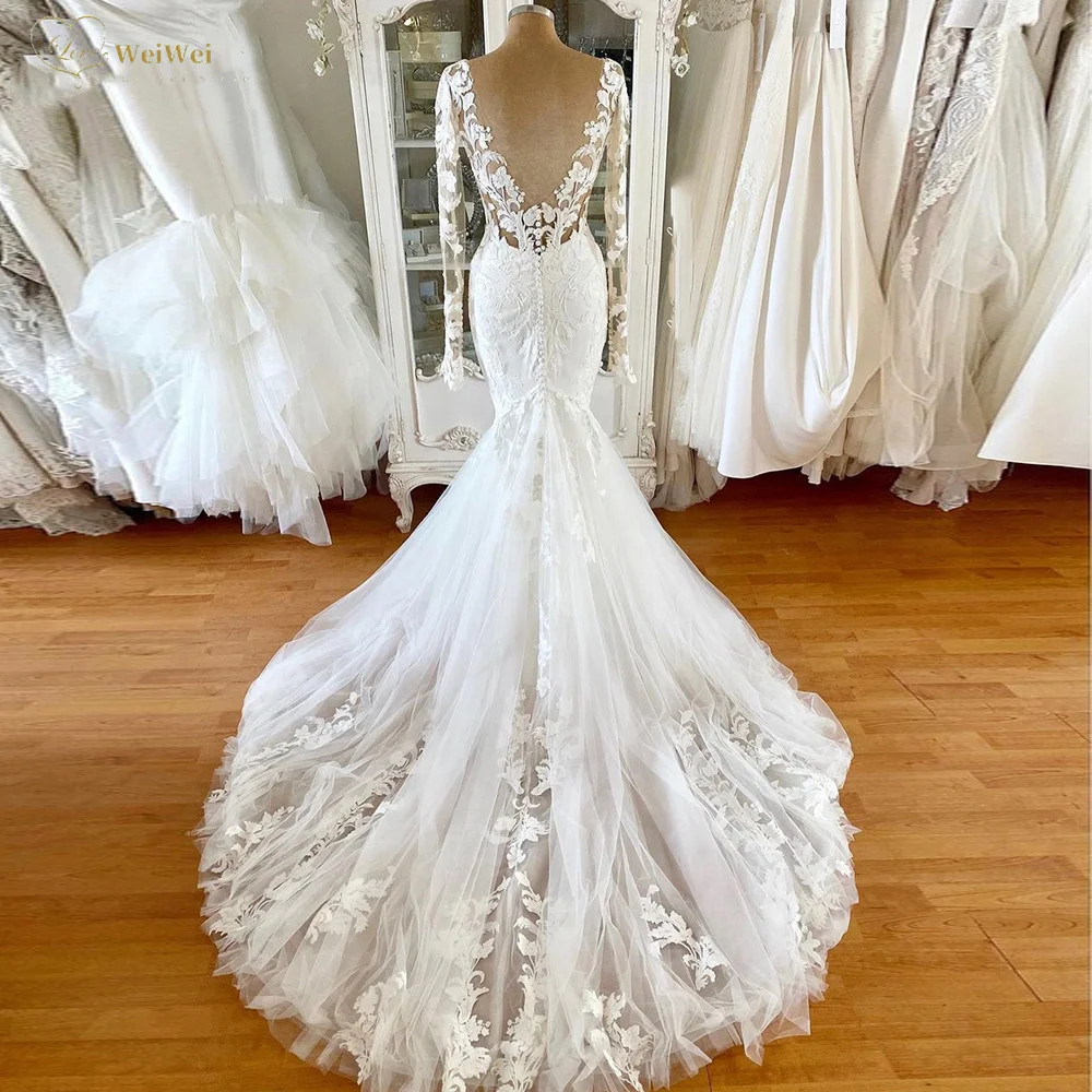 Ivory Wedding Gorgeous Mermaid Dresses Lace Appliques Chapel Train Long Sleeves Beach Bridal Gowns Deep V-neck Backless Sexy Bride Dress 2024 Bohemian