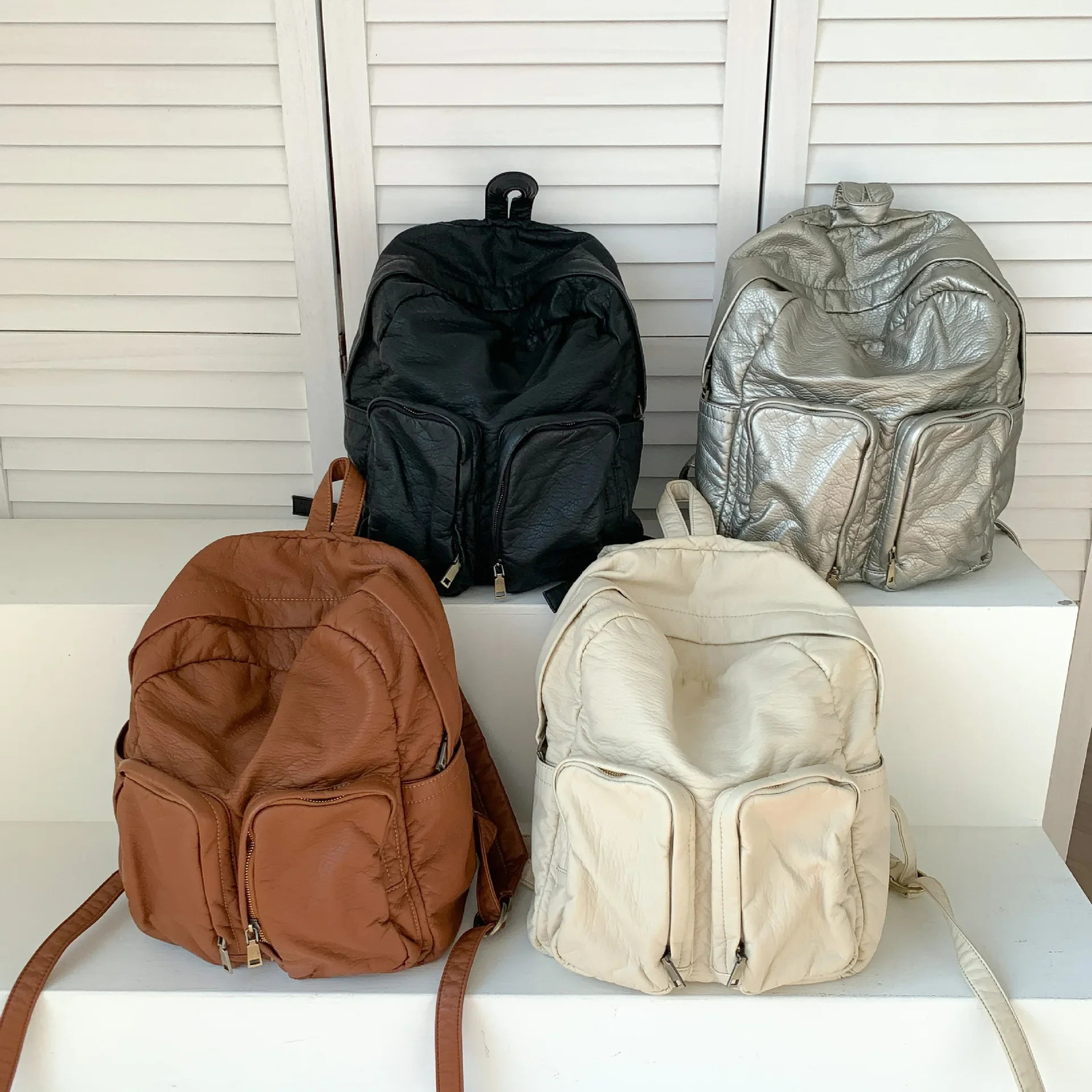 New Free Shipping Designer Bag Evening Bags LEFTSIDE 2025S Sier Travel Zipper Back Pack Korean Fashion Simple Solid Colorbackpack For Women School Tee