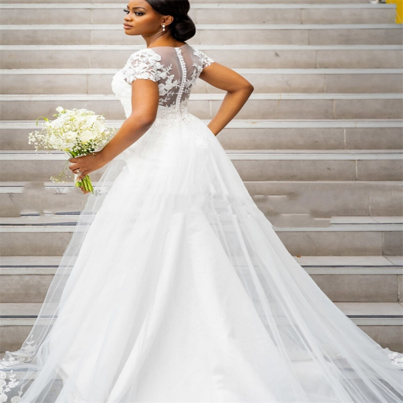 Princess African Mermaid Wedding Dress With Overskirt Train Elegant Cap Sleeves Appliques Lace Country Style Bride Dress Sexy V Neck Garde Beach Robe 