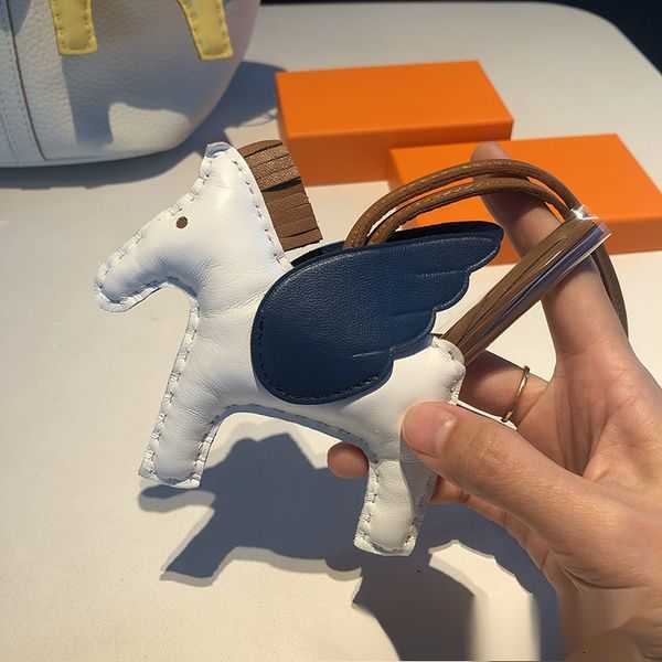 Real Sheepskin Leather Horse Bag Charm Keychain Pendant Classic Handbag Ornament Made by Hand 002 2C7NW
Real Sheepskin Leather Horse Bag Charm Keychain Pendant Classic Handbag Ornament Made by Hand 002 2C7NW