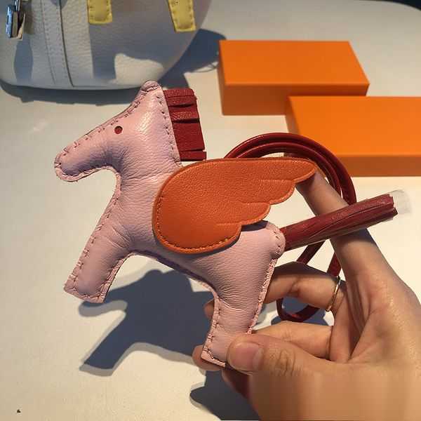 Real Sheepskin Leather Horse Bag Charm Keychain Pendant Classic Handbag Ornament Made by Hand 002 4HRBB
Real Sheepskin Leather Horse Bag Charm Keychain Pendant Classic Handbag Ornament Made by Hand 002 4HRBB