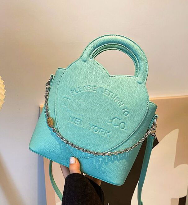 cowhide bag bucket bag women one shoulder crossbody bag designer handbag Litchi grain chain decoration tote luxury shopping bags leather bags purses backpack