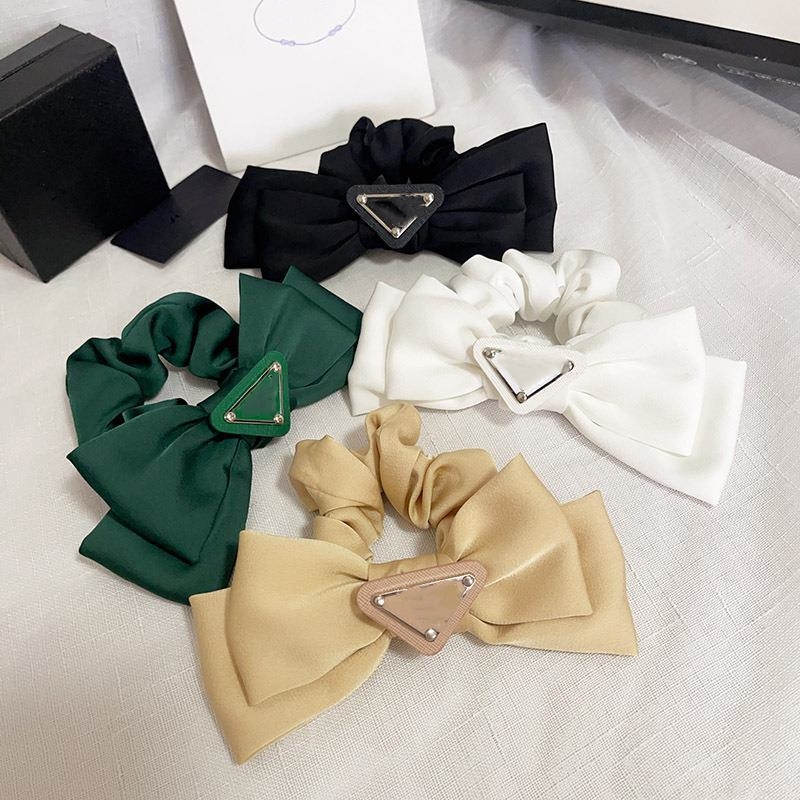 Designer Letter Triangle Bow Hair Ties Elastic Hair Bands For Women Girl Scrunchies Ponytail Holder Accessories Hair Rope
Designer Letter Triangle Bow Hair Ties Elastic Hair Bands For Women Girl Scrunchies Ponytail Holder Accessories Hair Rope