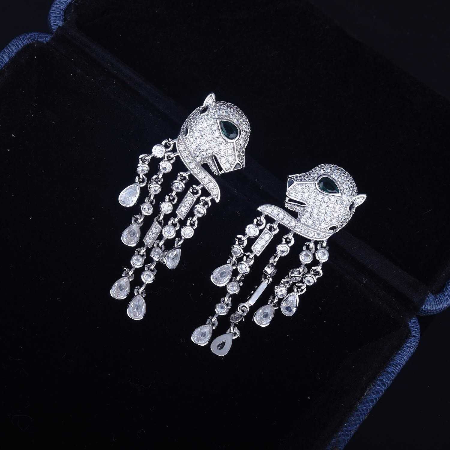 High version Carti's same full-size leopard earrings Heavy engineering design temperament senior sense head tassel long