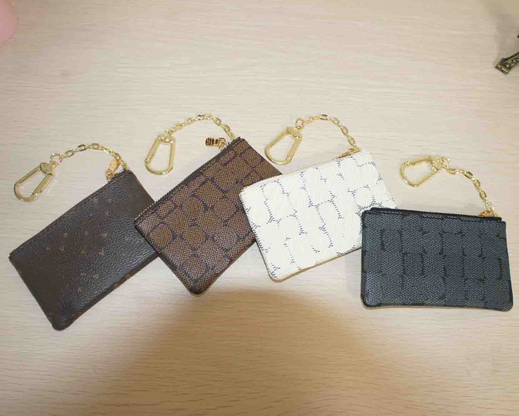 designer wallets bag 4 colors Keychain Ring KEY POUCH coin purse Damier leather Credit Card Holder women men small zipper purses Wallet with box and dust bag M62650, Brown flower
designer wallets bag 4 colors Keychain Ring KEY POUCH coin purse Damier leather Credit Card Holder women men small zipper purses Wallet with box and dust bag M62650, Brown flower