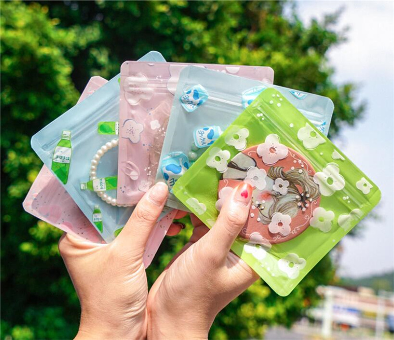 100pcs Resealable Packaging Bags Small Mylar Plastic Bags for Candy Coffee Beans Tea Dried Flowers Packaging Cartoon Packaging Pouch