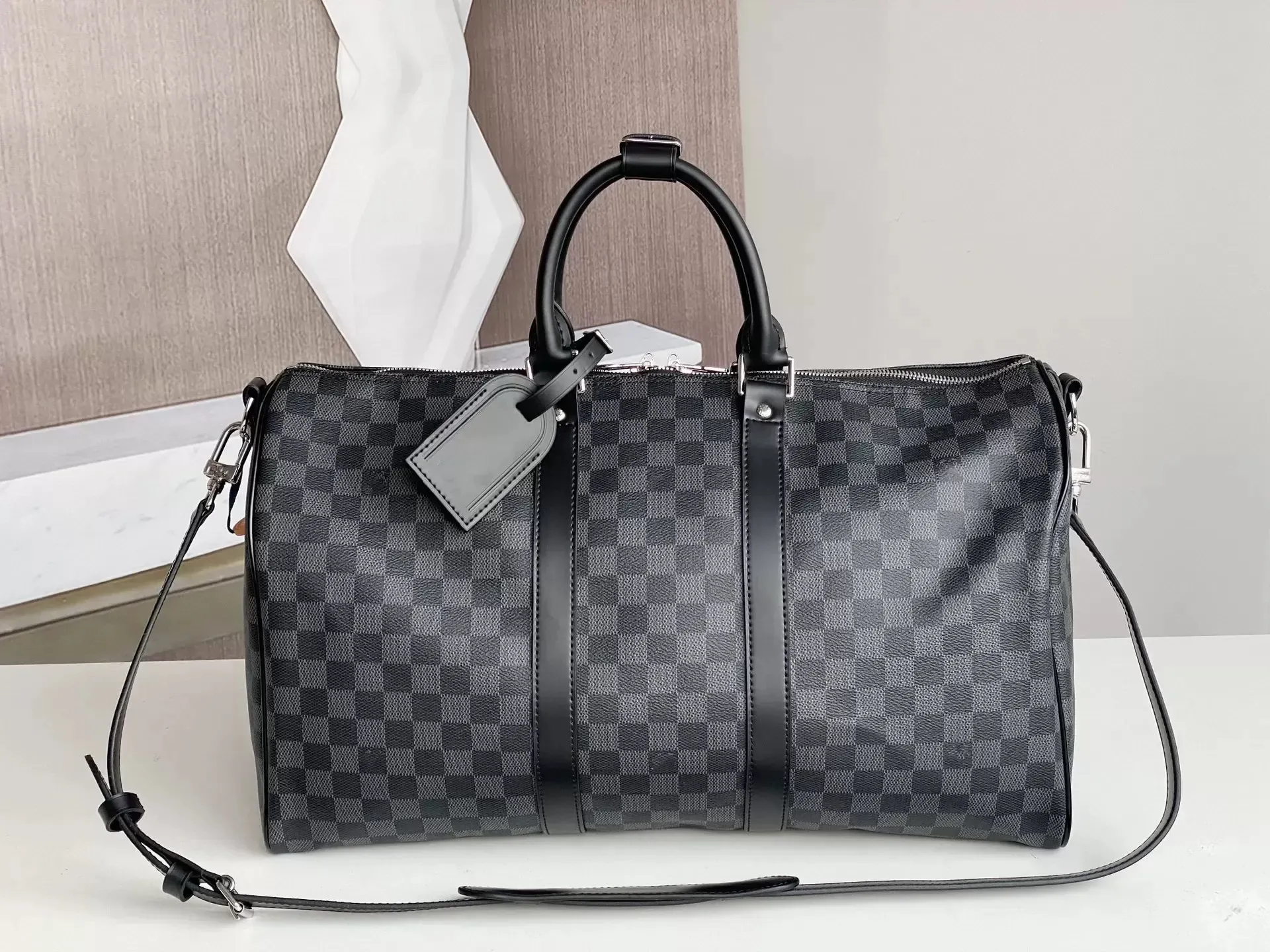 Top Designers fashion duffel bags luxury men female travel bags leather handbags large capacity holdall carry on luggage overnight weekender bag with lock 41414