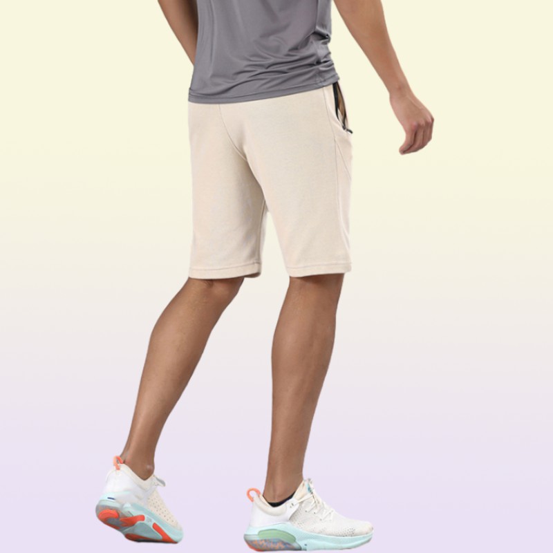 yoga clothes men039s new quickdrying solid color sports leisure running fitness fivepoint shorts with pockets