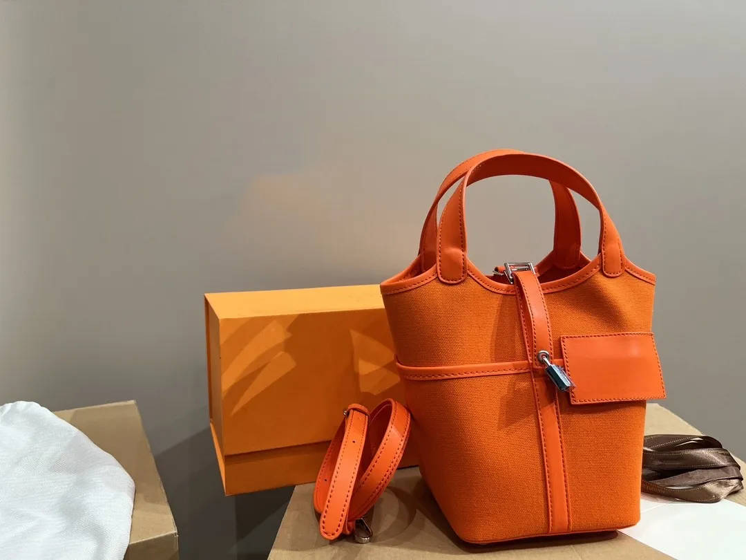 Brand Designer Bag Bucket Handbag One Shoulder bags Women's crossbody canvas bag classic vegetable basket Travel Shopping bags, Blue
Brand Designer Bag Bucket Handbag One Shoulder bags Women's crossbody canvas bag classic vegetable basket Travel Shopping bags, Blue