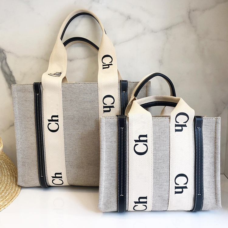 Shopping Large tote Woody bag luxury small medium Beach Womens mens Shoulder Bag designer handbag High quality Purses hottest Fashion Nylon Crossbody big bags
Shopping Large tote Woody bag luxury small medium Beach Womens mens Shoulder Bag designer handbag High quality Purses hottest Fashion Nylon Crossbody big bags
