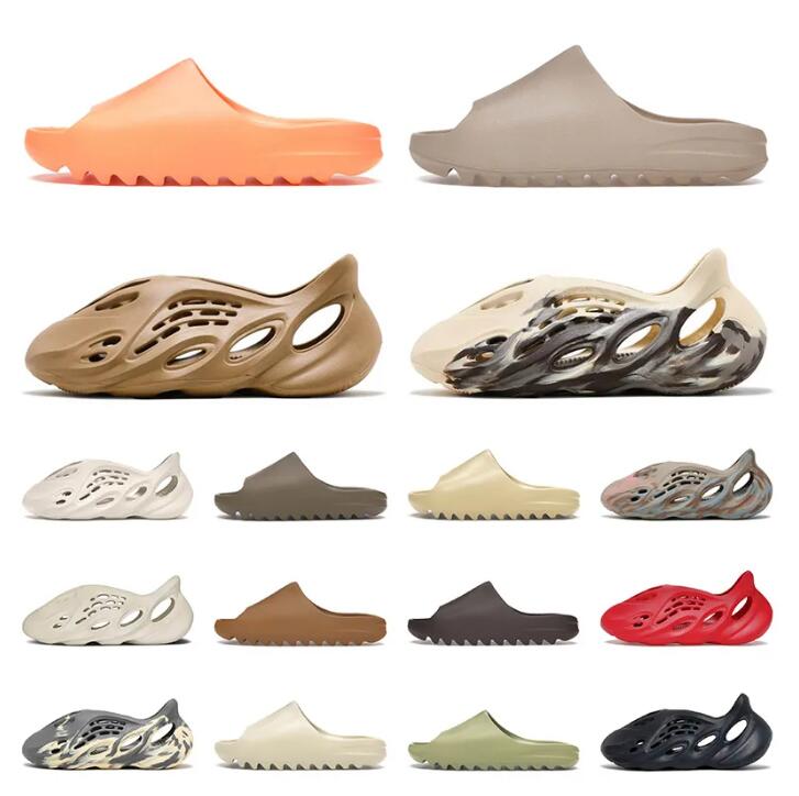 Runner Slippers Slide Yezzzies Sandals Sneakers Yeezzy Yeezies Designer Foam Pure Onyx Ochre Bone Sand Woman Women Men For Slider Sliders Slipper Sandal
Runner Slippers Slide Yezzzies Sandals Sneakers Yeezzy Yeezies Designer Foam Pure Onyx Ochre Bone Sand Woman Women Men For Slider Sliders Slipper Sandal