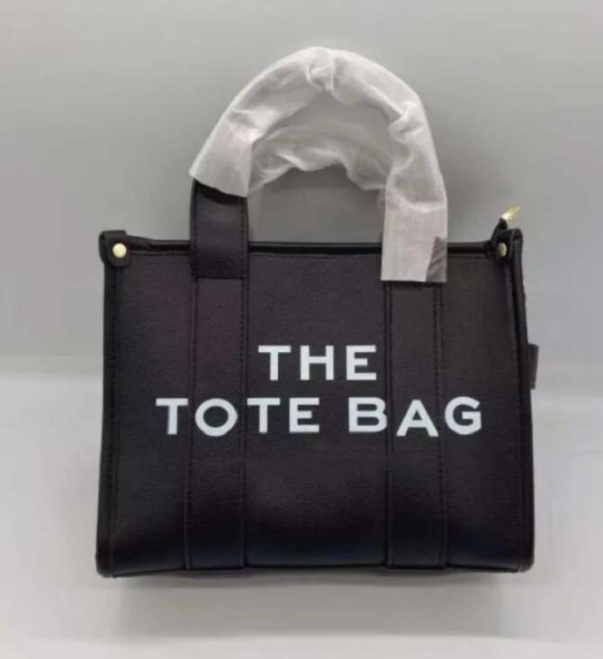 Luxury The Tote Bag Designer Women Mini Large canvas leather marc Crossbody Shoulder Handbags With strap Black Pink Totes Bags Handbag H007
Luxury The Tote Bag Designer Women Mini Large canvas leather marc Crossbody Shoulder Handbags With strap Black Pink Totes Bags Handbag H007