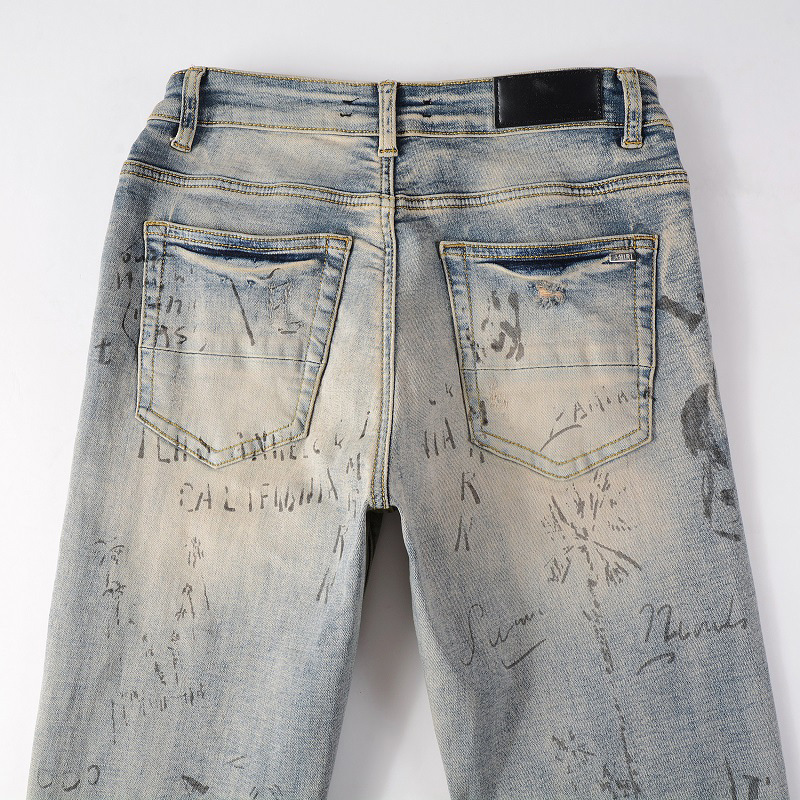 Fashion High street spray paint dazzle letters straight elastic zipper fly washed ripped jean