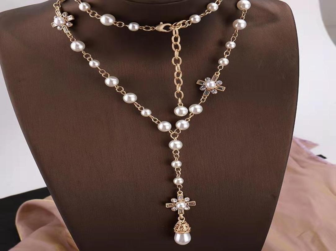 New necklace women039s long Korean Fashion Pendant with European and American famous pearl sweater Necklace
