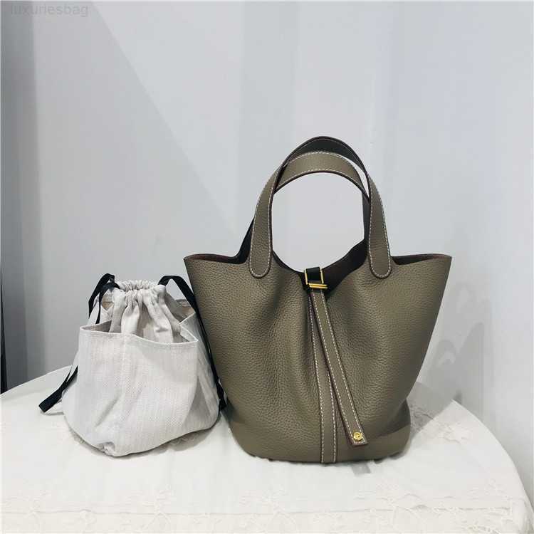 Designer Luxury Bag and Top Leather Women's Hand Shoulder Vegetable Basket Bucket Fashion Leisure BagX4VMXWFK Picotin, Black small
Designer Luxury Bag and Top Leather Women's Hand Shoulder Vegetable Basket Bucket Fashion Leisure BagX4VMXWFK Picotin, Black small