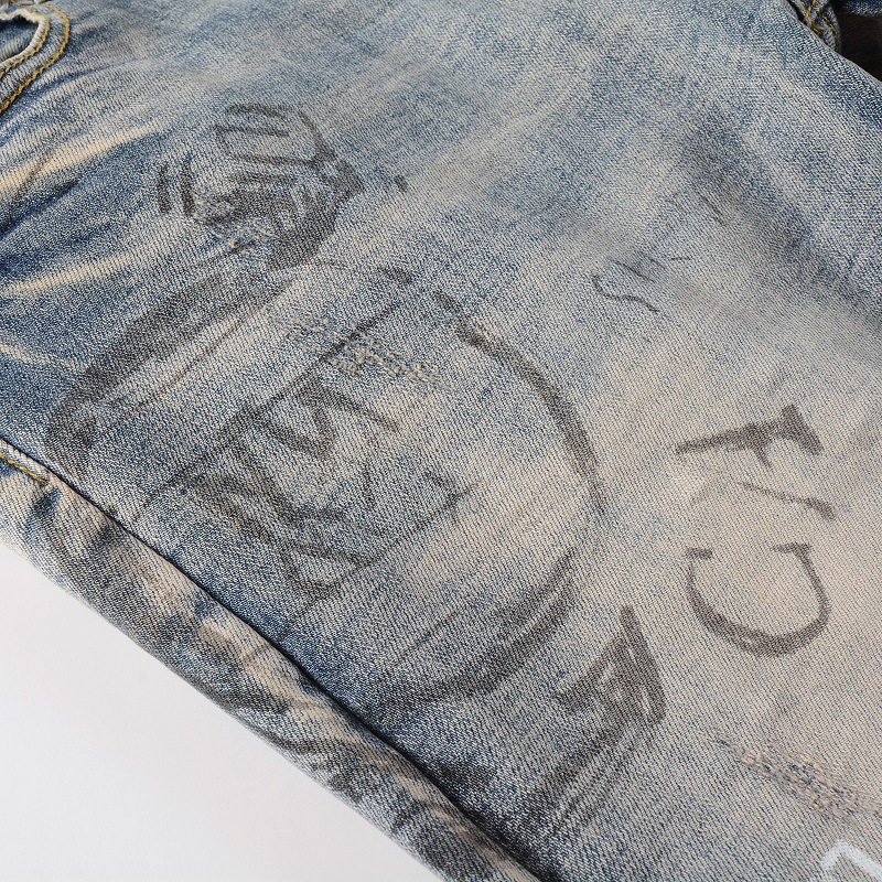 Fashion High street spray paint dazzle letters straight elastic zipper fly washed ripped jean