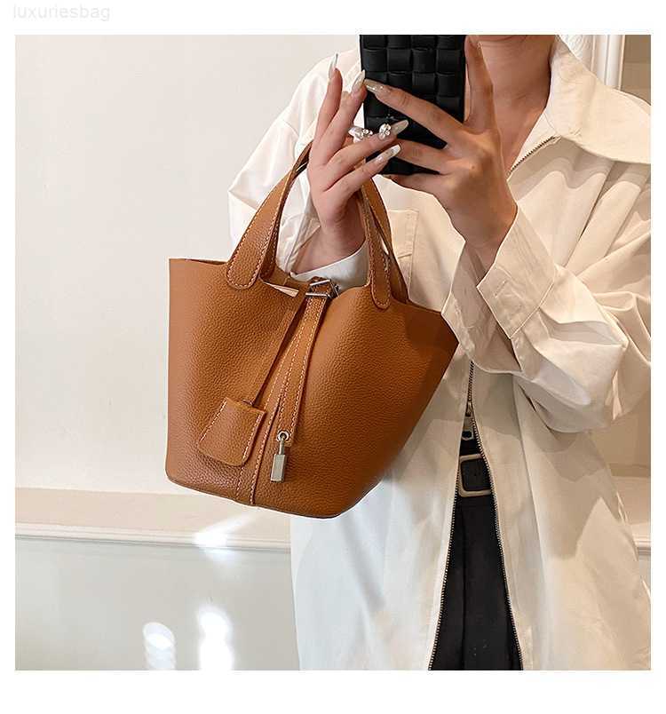 Designer Luxury Bag Small Highquality h for Women in Trend Fashionable and Minimalist Bucket Popular on the Internet Portable Vegetable Basket BagMS82R5QZ Picotin, Black7
Designer Luxury Bag Small Highquality h for Women in Trend Fashionable and Minimalist Bucket Popular on the Internet Portable Vegetable Basket BagMS82R5QZ Picotin, Black7
