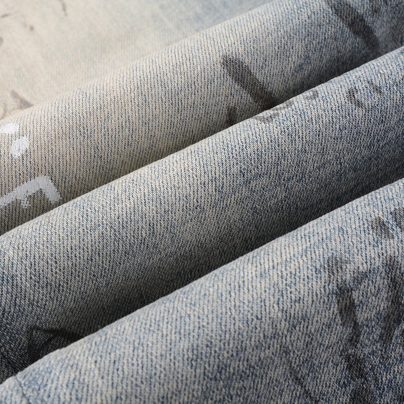 Fashion High street spray paint dazzle letters straight elastic zipper fly washed ripped jean