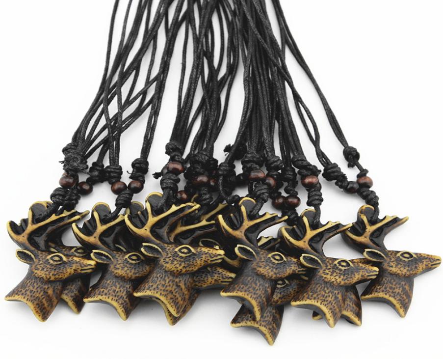 Jewelry Whole 12PCSLOT 12pcs Yak Bone Carved Christmas Deer Pendant Reindeer Head Necklace Choker Lucky presents christmas gi