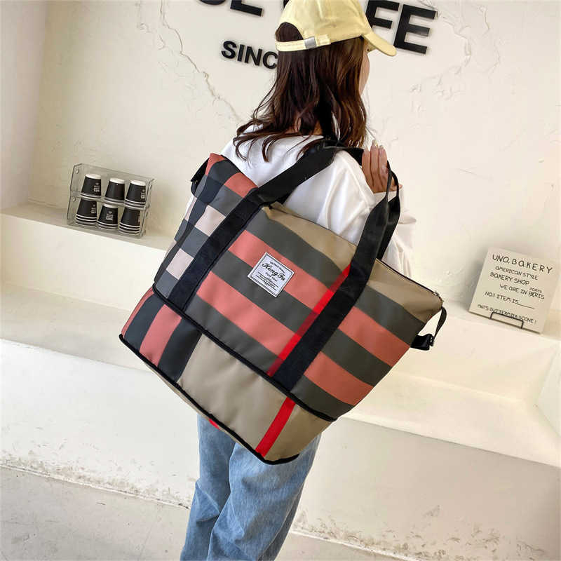 Duffel Bags 2023 New Fashion Folding Short Distance Travel Large Capacity Women s Hand Luggage Storage Wet and Dry Separation Fitness 230406