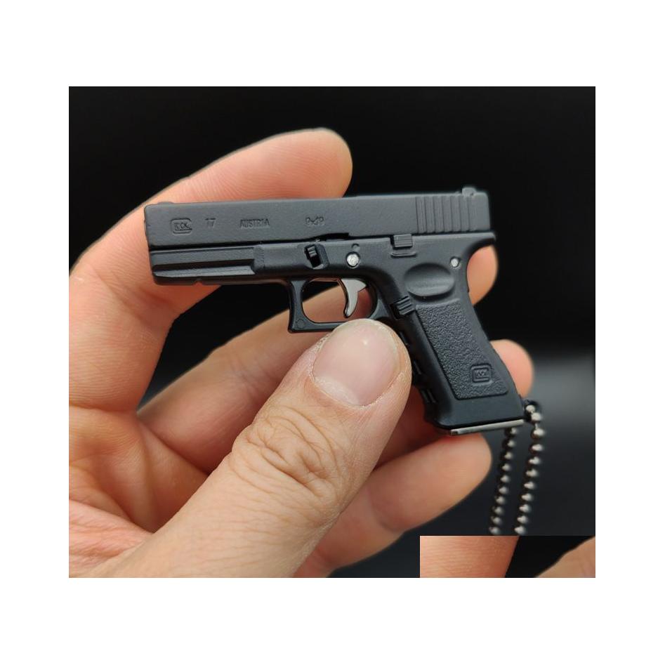 Mode Accessories Detachable G17 Alloy Gun Pistol Model Miniature Half Metal Mini Keychain Pendant Removable 1985 Drop Delivery Toys G Dh7En
Mode Accessories Detachable G17 Alloy Gun Pistol Model Miniature Half Metal Mini Keychain Pendant Removable 1985 Drop Delivery Toys G Dh7En