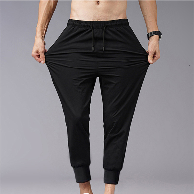 Men's Pants Men's Summer Thin Pants Korean Trend Nine Straight Tube Loose Ice Silk Elastic Sports Pants 230407