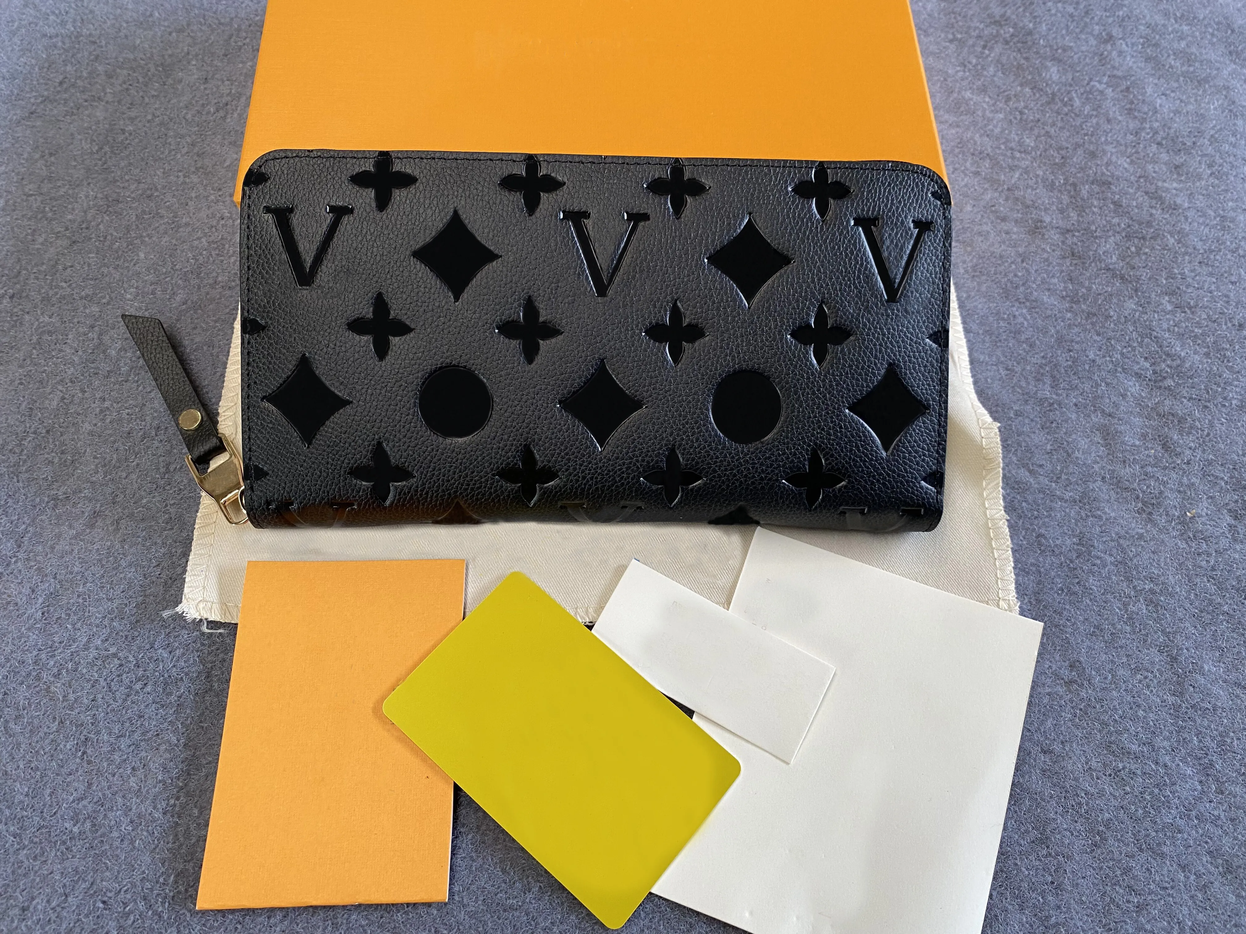 N60017 Luxury Designer Zippy Long Wallet Women's Zipper Brown Mono gram Canvers Leather Check Plaid Good Qaulity luxurybag116, Black flower
N60017 Luxury Designer Zippy Long Wallet Women's Zipper Brown Mono gram Canvers Leather Check Plaid Good Qaulity luxurybag116, Black flower