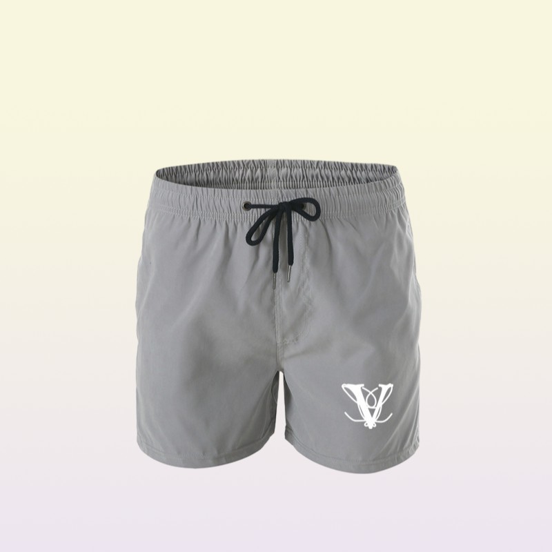 Beach pants fashion new Khmer shorts solid color printing men039s summer wind beach swimming shorts men039s high quality box