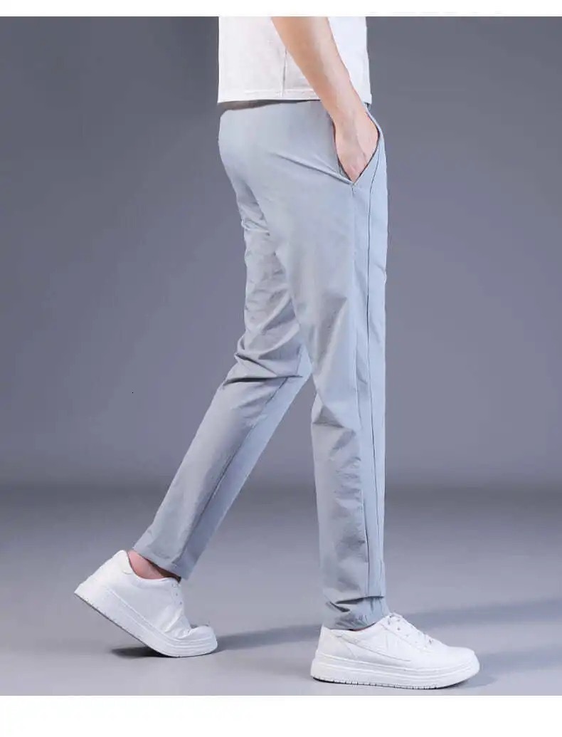 Men's Pants Summer and Spring Air Conditioned Pants Loose Quick Drying Sports Elastic Waist Brushed Asian Size 230407